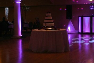 uplighting with cake table trinity.jpg